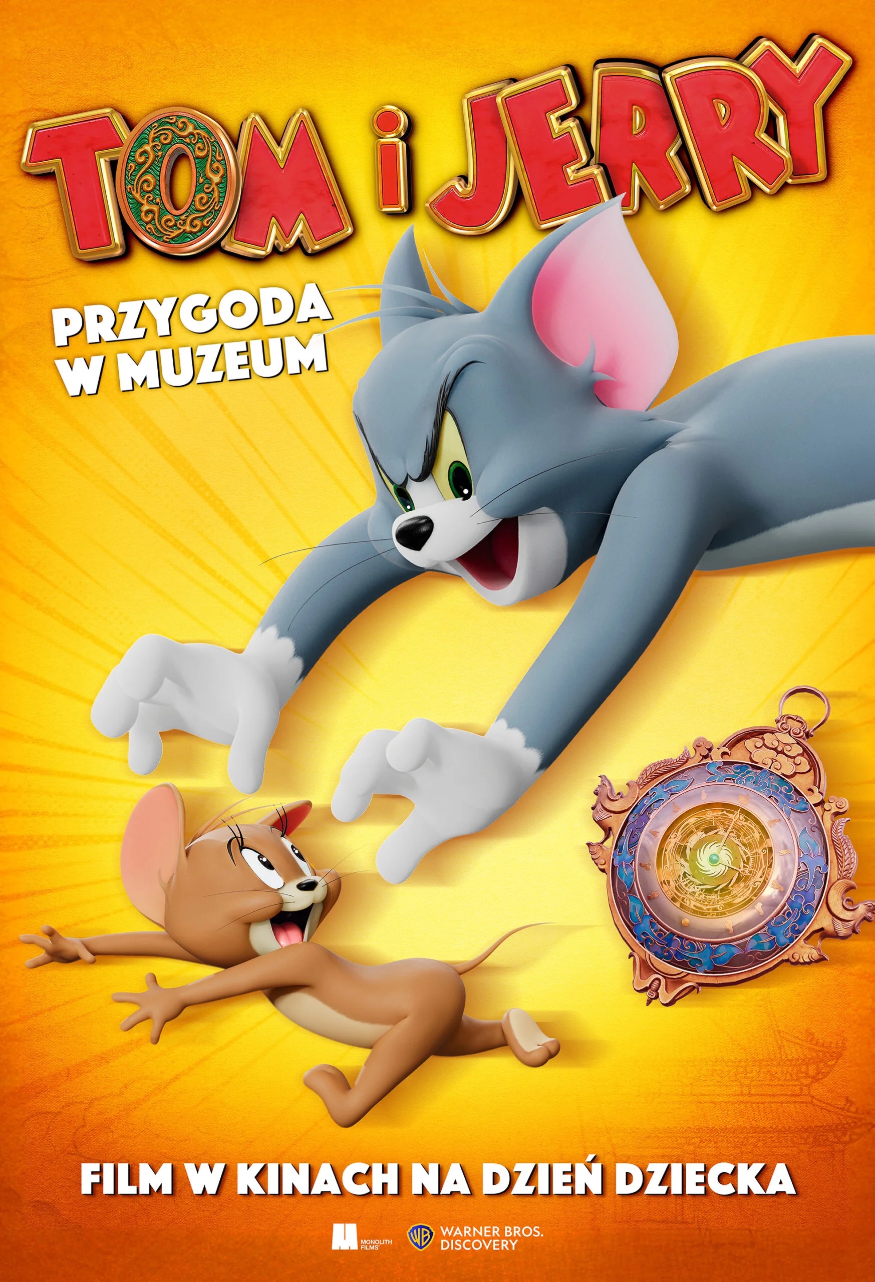 Plakat filmu „Tom i Jerry: Przygoda w muzeum”: Tom ściga Jerry’ego obok ozdobnego magicznego kompasu.